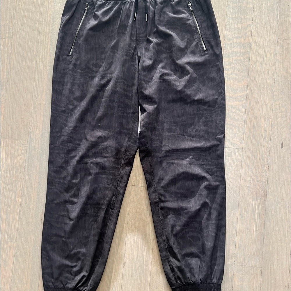 Athleta Black Track Pants with Relaxed Fit and Elastic Cuffs